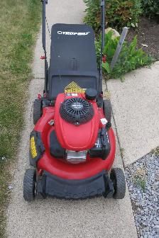 Troybilt push lawnmower-Honda engine. Tuned-up