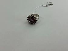 bague en argent avec pierre mauve