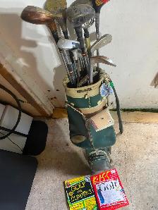 12 golf clubs and Bag and 2 Books