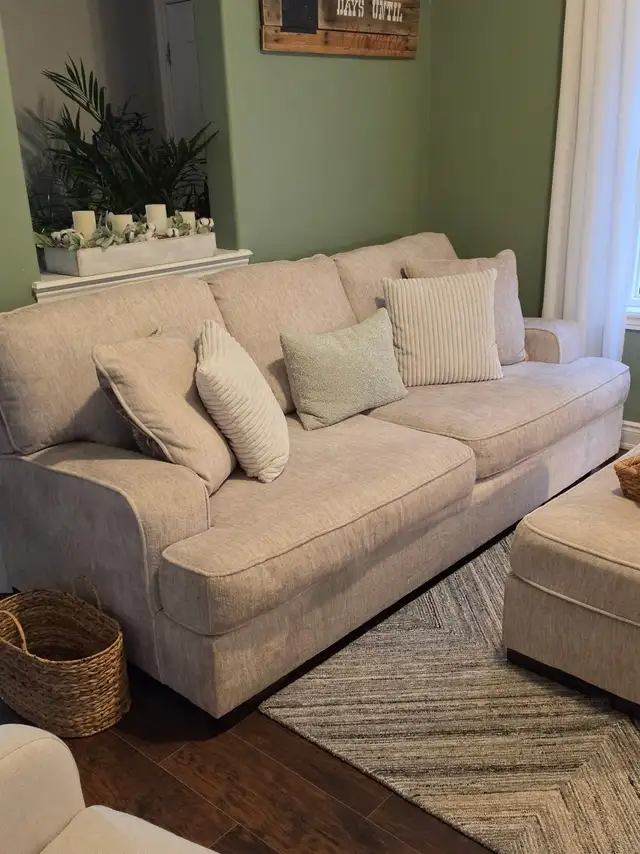 cream coloured sofa& chair & 1/2 for sale with ottoman