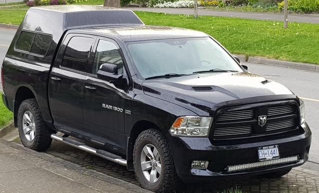 Decked out black 2012 Ram 1500 Sport only 70K kilometers