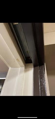 pocket doors fell off truck , not rolling.If you experience prob - Photo 5