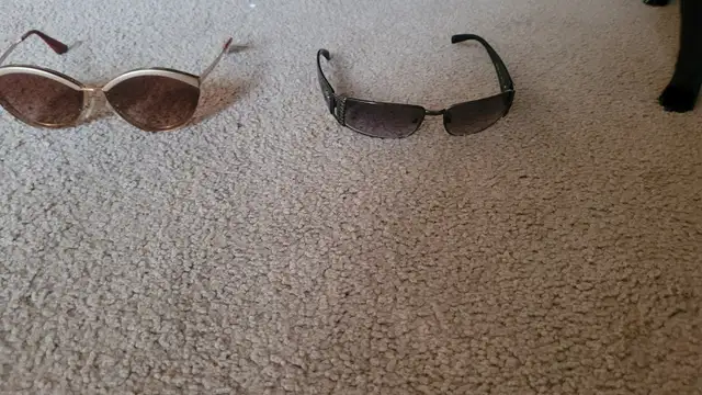 Prada and Versace sunglasses