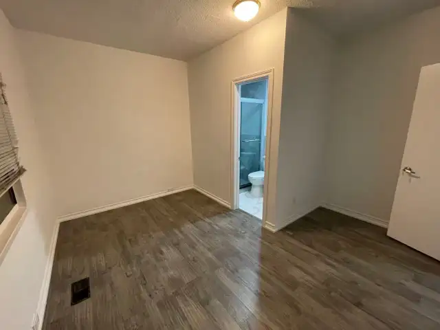 bedroom with private bathroom