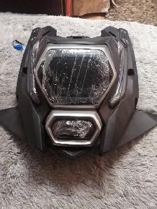 Headlight with black fairing mask for a dirt bike