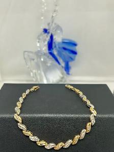 14k Two Tone Wavy S Diamond Bracelet