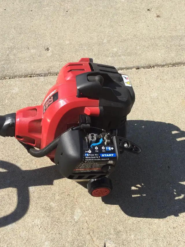 Troy-Bilt  27cc 2-Cycle Gas String Grass Trimmer, 16" swath