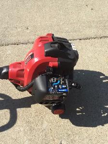 Troy-Bilt  27cc 2-Cycle Gas String Grass Trimmer, 16" swath