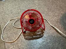 Small personal red electric fan