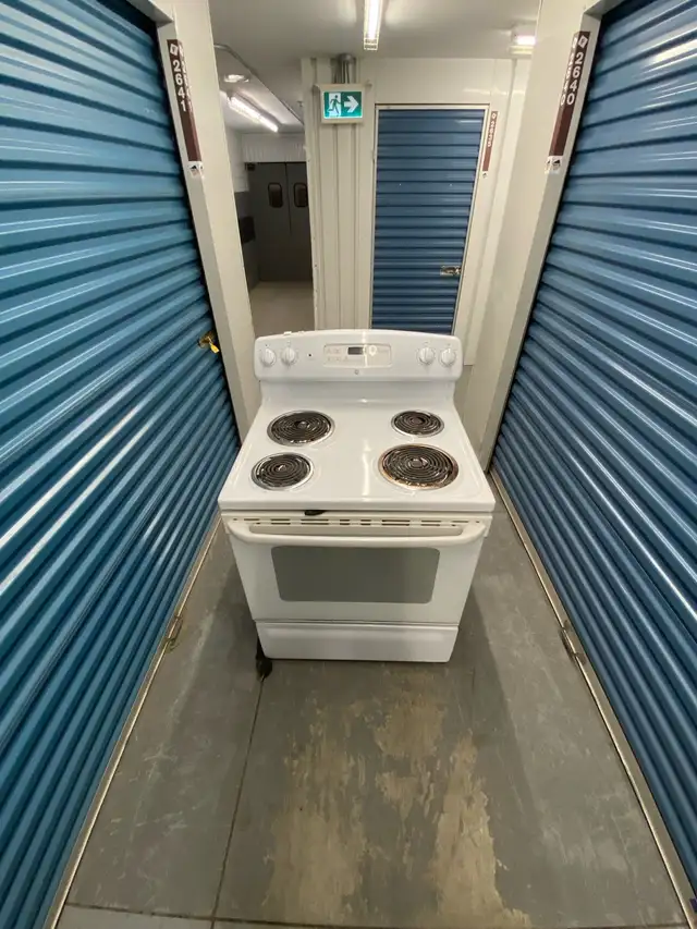 SLIGHTLY USED ELECTRIC STOVE