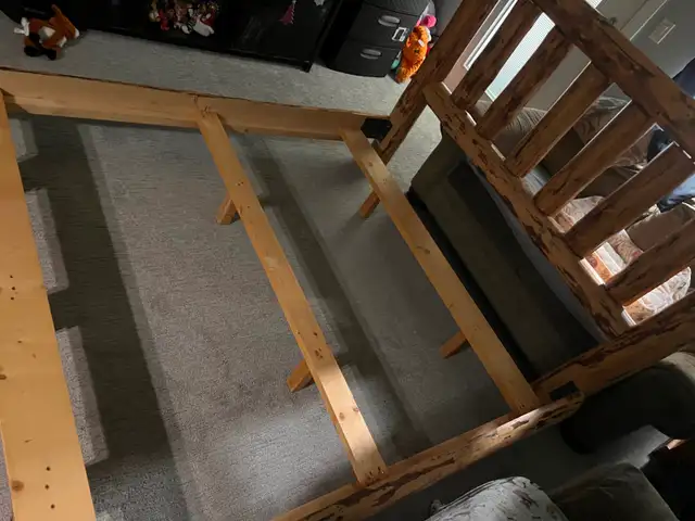 Homemade queen log bed frame