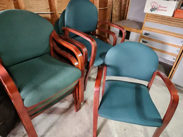 8 green office chairs