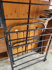 Black metal single bed frame