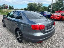 2014 Volkswagen Jetta 4dr 1.8 TSI Auto Highline CERTIFIED - Photo 3