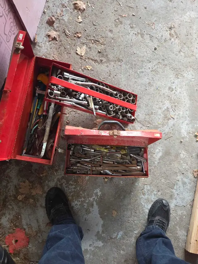assorted tools with boxes