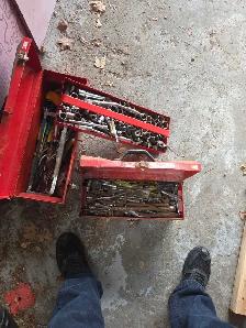 assorted tools with boxes