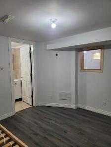 A room  with a privet bathroom  in a walkout basement - Photo 7