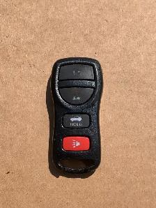 Nissan 4 buttons keyless entry remote FOB.  I do not program.