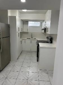 NEW 3-Bdr Legal Basement Apt — Private Entry, Parking, & Laundry - Photo 2