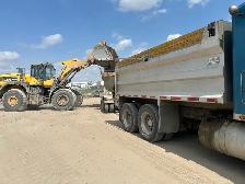 hauling material and equipment - Photo 5