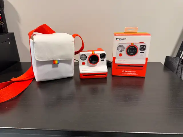 Polaroid instant camera and carrying case