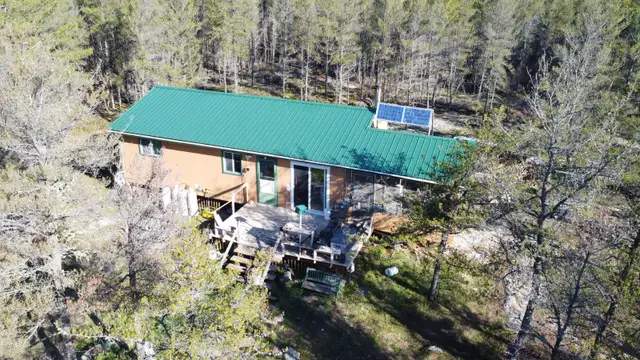WORLD-CLASS FISHING • WATERFRONT WILDERNESS • FOUR-SEASON RETREA