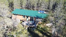 WORLD-CLASS FISHING • WATERFRONT WILDERNESS • FOUR-SEASON RETREA