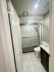 ✨ Modern Renovated Basement | Private Entrance | Prime Location - Photo 4