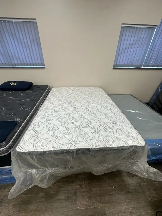 BRAND NEW QUEEN MATTRESS