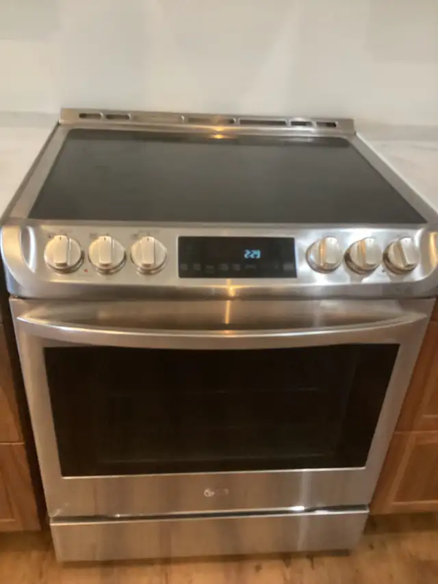 Lg slide in stainless range stove