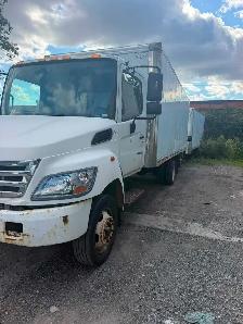 Cube truck driver open position