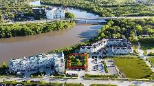 Rare Opportunity to Invest in a 120' x 167' Riverfront Lot!