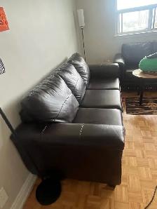 2 faux leather couches - Photo 7
