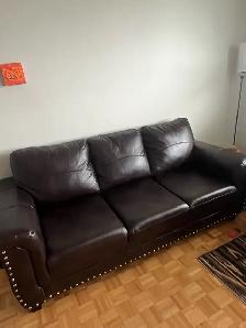 2 faux leather couches - Photo 8