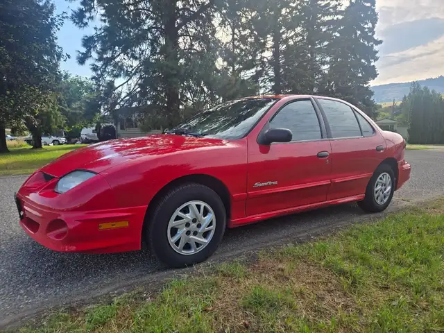 2002 PONTIAC SUNFIRE SL 4 DOOR 5 SPEED  LOW KMS