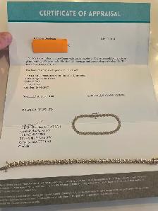 Gorgeous 10K gold and diamond 7 1/4" ladies tennis bracelet