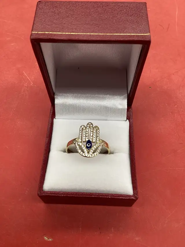 bague en or main de fatma et œil grec