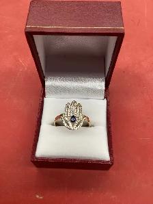 bague en or main de fatma et œil grec