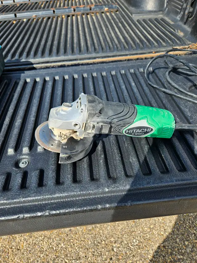 Hitachi 4 inch Angle Grinder, works great. $ 30