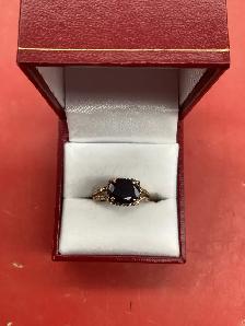 bague en or avec pierre noire - Photo 2