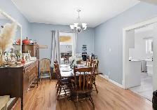 Beautifully updated 1531sqft 4bdrm home in the heart of West K! - Photo 4
