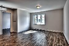 LOGEMENT 4 ½  GARAGE, GRAND BALCON, STATIONNEMENT, CABANON! - Photo 4