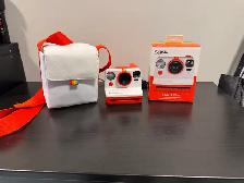 Polaroid instant camera and carrying case