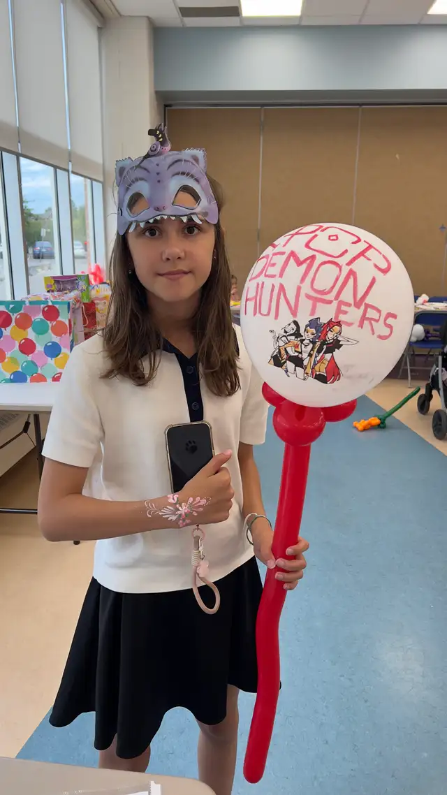 face painting and twisted balloons