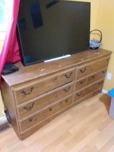 Older but solid wood dresser