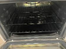 Cuisinière blanche ronds serpentins GE - Photo 3