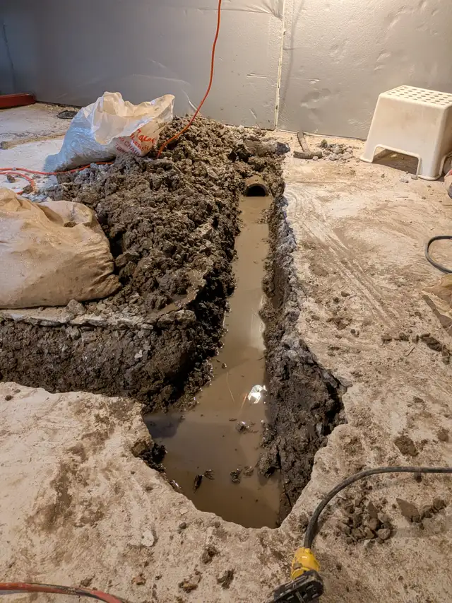 DRAIN SNAKE ROUGH IN WASHROOM SUMP PUMP ISSUE WATERPROOFING WET