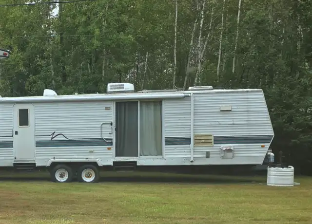 Two Older Travel Trailers for Salvage.
