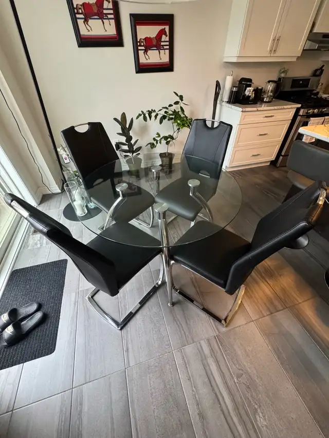 glass top kitchen table with black leather chairs