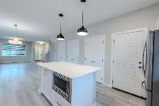 4-BEDROOM HOUSE FOR RENT – WOLF CREEK SE, CALGARY - Photo 2